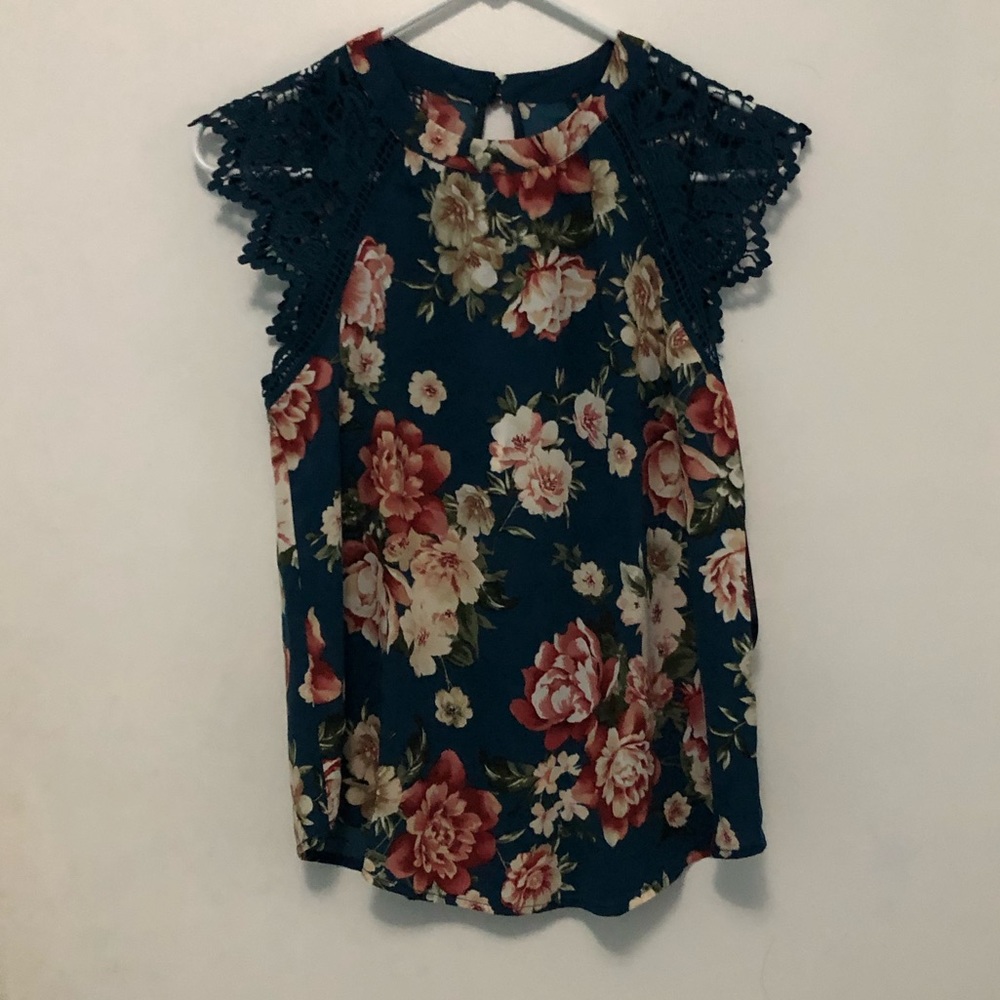 navy shirt with floral pattern and lace sleeves